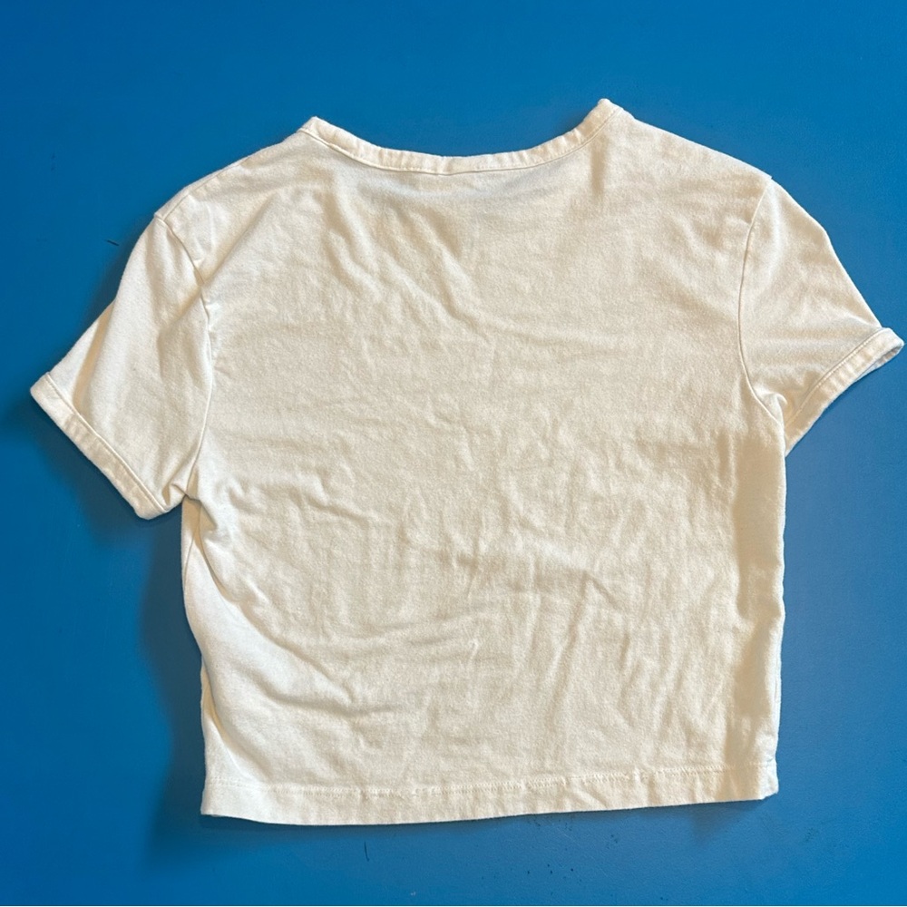 Women’s white cropped tee.   Size says medium but runs small